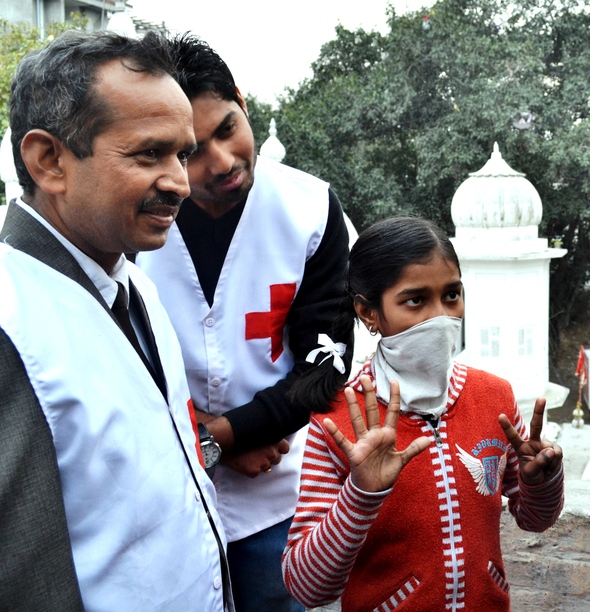 14-year-old Sushi Singh, suffering from MDR TB showing how many pills per day she takes