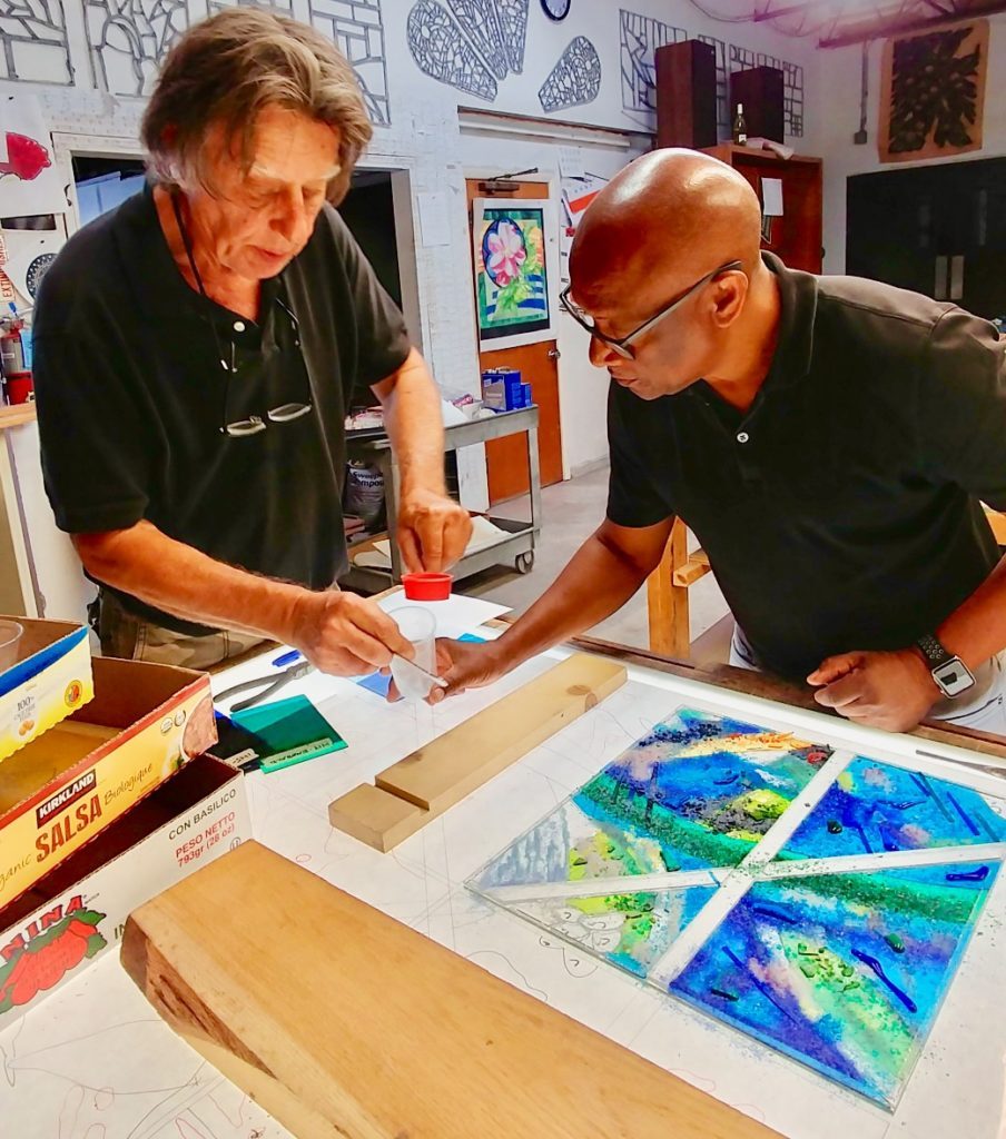 Antonius Roberts looking through work