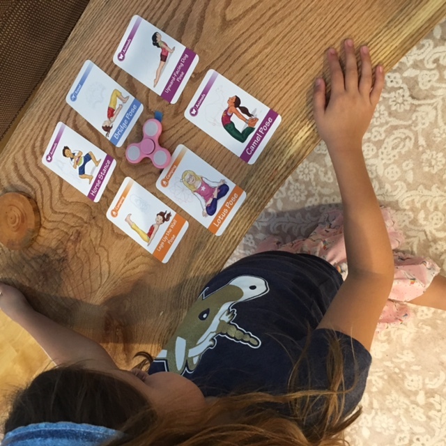 Yoga Pose Spinner Game learn, be active, and have fun!