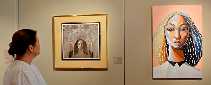 Marysa-inspecting-paintings
