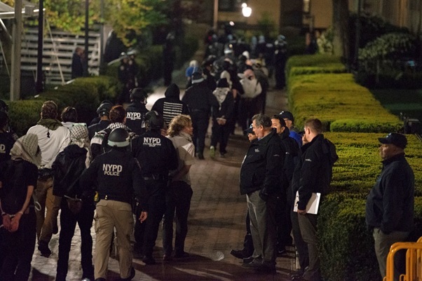 NYPD officers on Tuesday night arresting pro-Hamas protesters at Columbia University